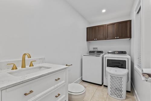 Salle de lavage - 2345 Rue Du Passerin, Laval (Sainte-Rose), QC - Indoor Photo Showing Laundry Room