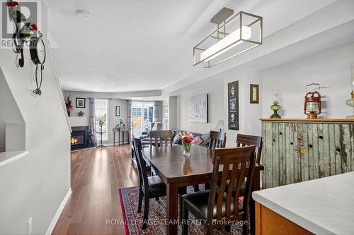 144 Berrigan Drive, Ottawa, ON - Indoor Photo Showing Dining Room With Fireplace