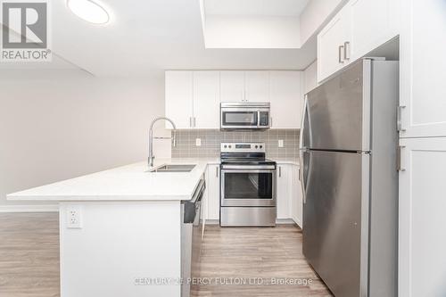 516 - 1555 Kingston Road, Pickering, ON - Indoor Photo Showing Kitchen With Stainless Steel Kitchen With Double Sink With Upgraded Kitchen