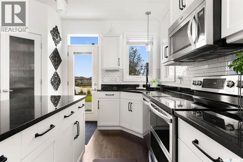 5061 Snowbirds Crescent, Regina, SK - Indoor Photo Showing Kitchen With Upgraded Kitchen