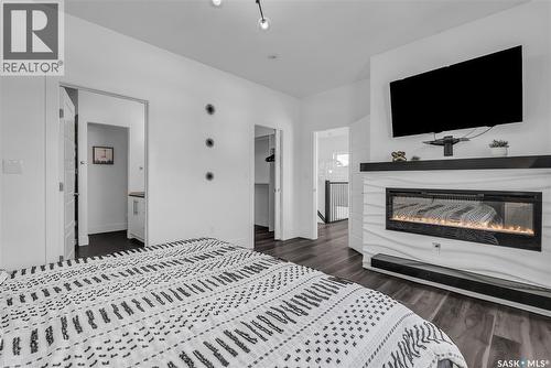 231 Atton Court, Saskatoon, SK - Indoor Photo Showing Bedroom With Fireplace