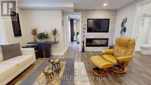 70 Wilderness Way, Ottawa, ON - Indoor Photo Showing Living Room With Fireplace