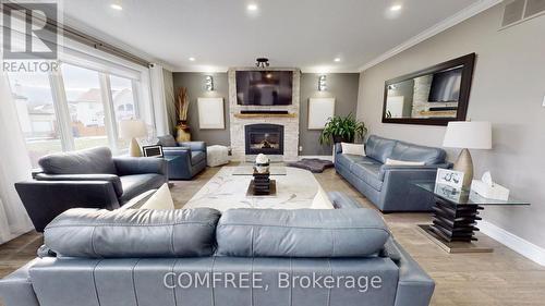 70 Wilderness Way, Ottawa, ON - Indoor Photo Showing Living Room With Fireplace