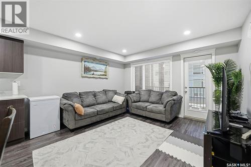 213 110 Akhtar Bend, Saskatoon, SK - Indoor Photo Showing Living Room