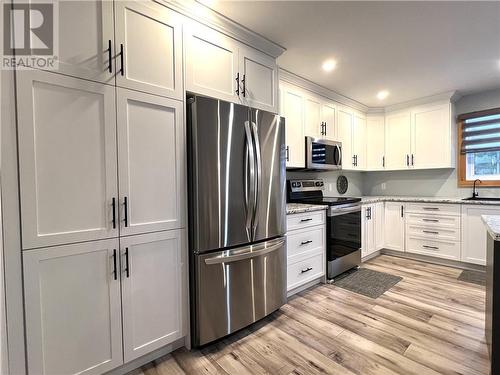 11 Chevrefils, St. Charles, ON - Indoor Photo Showing Kitchen