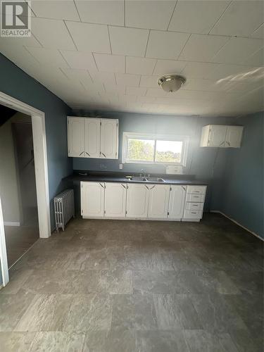 94 Memorial Street, Bell Island, NL - Indoor Photo Showing Garage