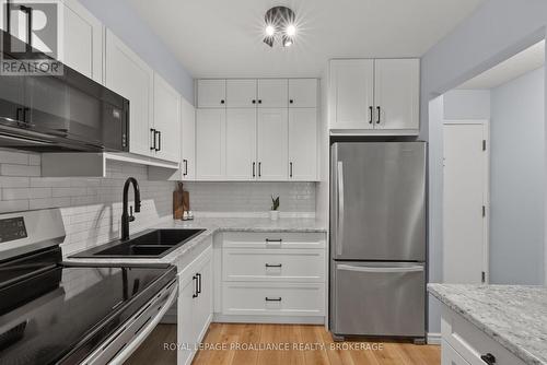 312 - 310 Kingsdale Avenue, Kingston (East Gardiners Rd), ON - Indoor Photo Showing Kitchen With Double Sink With Upgraded Kitchen