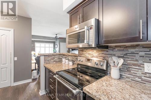 210 - 40 Ferndale Drive S, Barrie, ON - Indoor Photo Showing Kitchen With Upgraded Kitchen