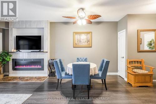 210 - 40 Ferndale Drive S, Barrie, ON - Indoor With Fireplace