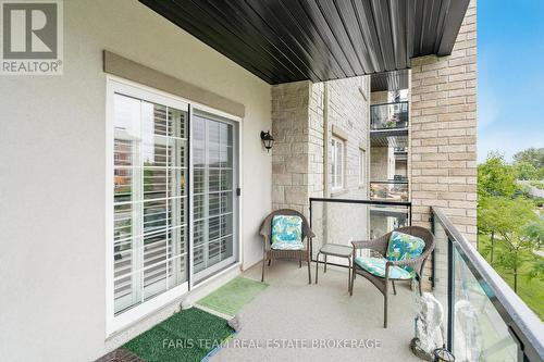 210 - 40 Ferndale Drive S, Barrie, ON - Outdoor With Balcony With Exterior