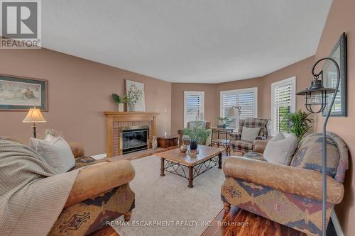 35 Highland Boulevard, Haldimand, ON - Indoor Photo Showing Living Room With Fireplace