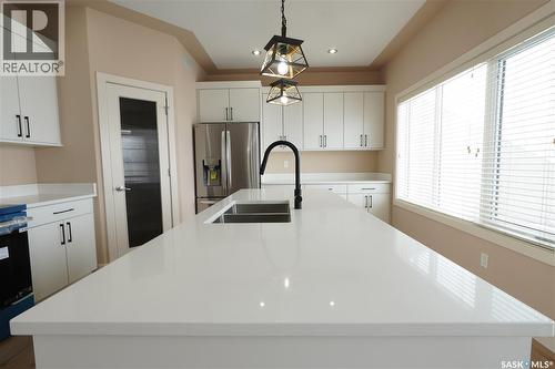 15 Christopher Place, White City, SK - Indoor Photo Showing Kitchen With Double Sink
