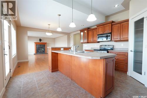 15 Christopher Place, White City, SK - Indoor Photo Showing Kitchen With Double Sink