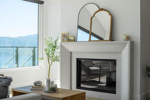 1327 Vineyard Drive, West Kelowna, BC - Indoor Photo Showing Living Room With Fireplace