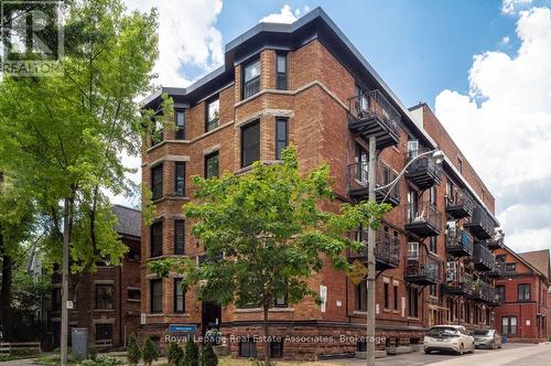 108 - 160 Huron Street, Toronto, ON - Outdoor With Facade