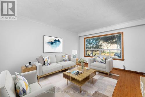 25 Falstaff Avenue, Toronto, ON - Indoor Photo Showing Living Room