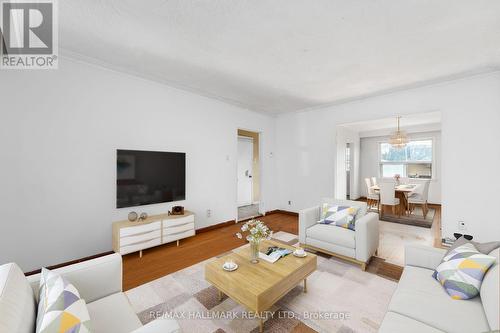 25 Falstaff Avenue, Toronto, ON - Indoor Photo Showing Living Room