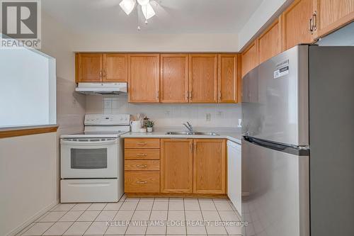 404 - 1270 Maple Crossing Boulevard, Burlington, ON - Indoor Photo Showing Kitchen With Double Sink