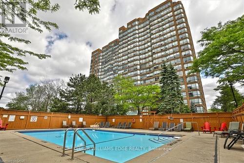 404 - 1270 Maple Crossing Boulevard, Burlington, ON - Outdoor With In Ground Pool