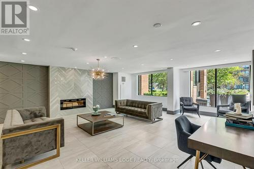 404 - 1270 Maple Crossing Boulevard, Burlington, ON - Indoor With Fireplace