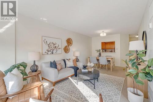 404 - 1270 Maple Crossing Boulevard, Burlington, ON - Indoor Photo Showing Living Room