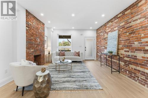 51 Withrow Avenue, Toronto, ON - Indoor Photo Showing Other Room With Fireplace