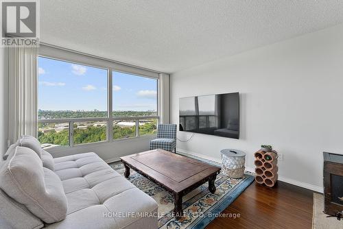 2009 - 7 Concorde Place, Toronto, ON - Indoor Photo Showing Living Room With Fireplace