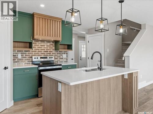 4748 Ferndale Crescent, Regina, SK - Indoor Photo Showing Kitchen With Double Sink With Upgraded Kitchen