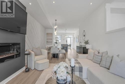 86 Brandon Crescent, New Tecumseth, ON - Indoor Photo Showing Living Room With Fireplace