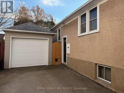 Long drive leads to detached garage - 