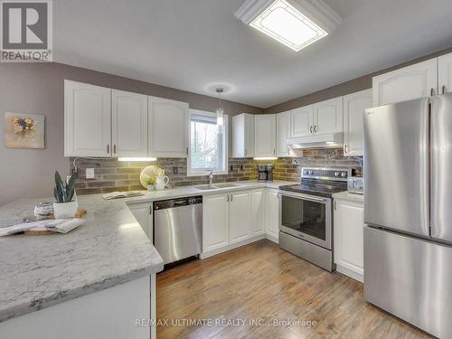 71 61St Street S, Wasaga Beach, ON - Indoor Photo Showing Kitchen With Stainless Steel Kitchen With Double Sink With Upgraded Kitchen