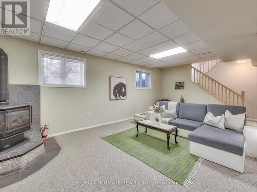 71 61St Street S, Wasaga Beach, ON - Indoor Photo Showing Basement With Fireplace