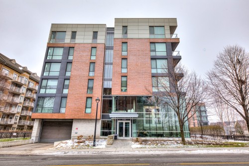 Front of Structure - 606-2480 Rue Des Nations, Montréal (Saint-Laurent), QC - Outdoor With Facade