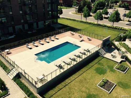 Pool - 606-2480 Rue Des Nations, Montréal (Saint-Laurent), QC - Outdoor With In Ground Pool