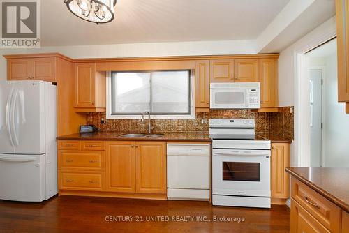 1002 Albany Court, Peterborough (Ashburnham Ward 4), ON - Indoor Photo Showing Kitchen With Double Sink
