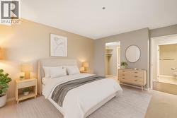 Virtually Staged - Primary Bedroom w/ walk-in closet + ensuite - 