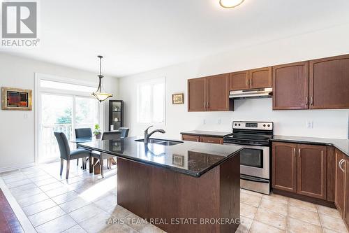 83 White Sands Way, Wasaga Beach, ON - Indoor Photo Showing Kitchen With Double Sink