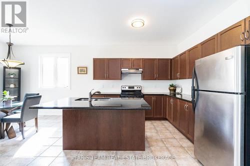 83 White Sands Way, Wasaga Beach, ON - Indoor Photo Showing Kitchen With Double Sink