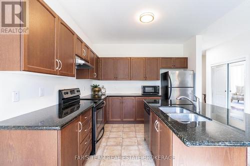 83 White Sands Way, Wasaga Beach, ON - Indoor Photo Showing Kitchen With Double Sink