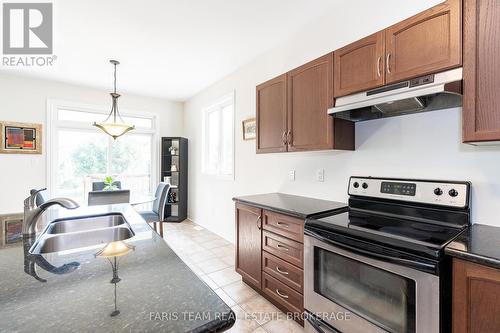 83 White Sands Way, Wasaga Beach, ON - Indoor Photo Showing Kitchen With Double Sink