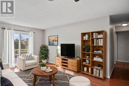 Photo is virtually staged - 301 - 580 Armstrong Road, Kingston (East Gardiners Rd), ON - Indoor Photo Showing Living Room