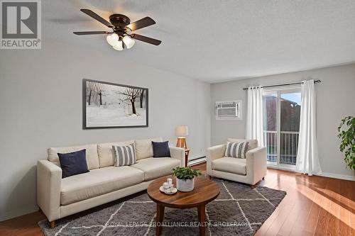 Photo is virtually staged - 301 - 580 Armstrong Road, Kingston (East Gardiners Rd), ON - Indoor Photo Showing Living Room