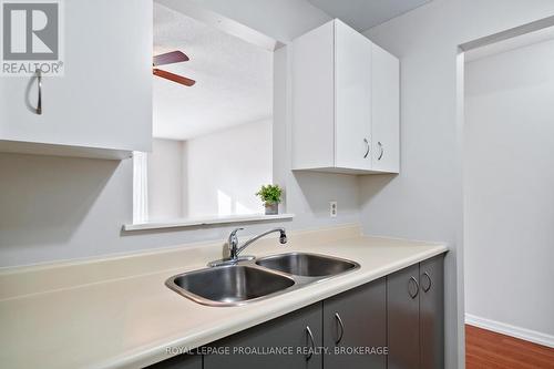301 - 580 Armstrong Road, Kingston (East Gardiners Rd), ON - Indoor Photo Showing Kitchen With Double Sink