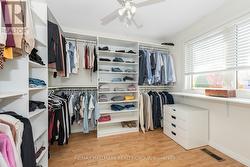 Bedroom 4, currently used as a walk-in closet - 