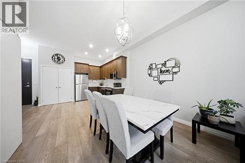 Dining space featuring light wood-style flooring and recessed lighting - 85 Morrell Street Unit# 102A, Brantford, ON - Indoor Photo Showing Dining Room