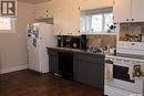 203 5Th Avenue W, Assiniboia, SK  - Indoor Photo Showing Kitchen With Double Sink 