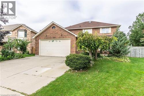 View of front facade featuring a front lawn and a garage - 115 Cranston Avenue, Cambridge, ON - Outdoor