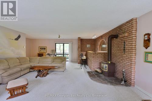 1 Lindale Avenue, Tiny, ON - Indoor Photo Showing Living Room With Fireplace