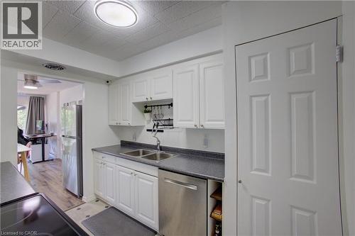 91 Conroy Crescent Unit# 202, Guelph, ON - Indoor Photo Showing Kitchen With Double Sink