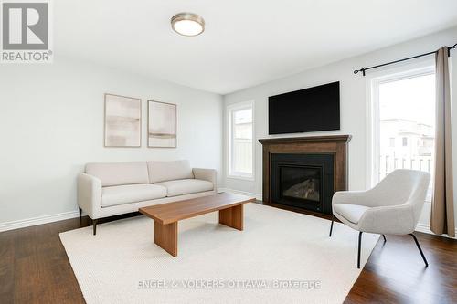107 Santolina Street, Ottawa, ON - Indoor Photo Showing Living Room With Fireplace